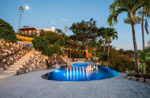 Stunning Mountaintop Property with Stylish Main Home, Private Guesthouse & Infin
