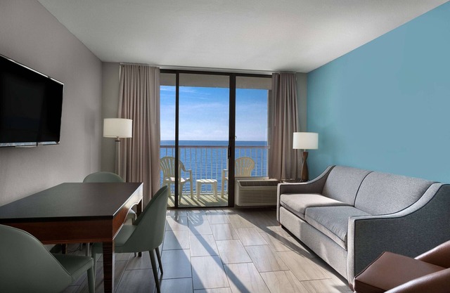 Superbe suite face à l'océan avec balcon + privilèges de location officiels sur place