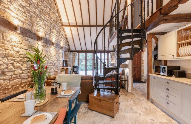 Stunning open plan 2 storey barn conversion with spiral staircase.