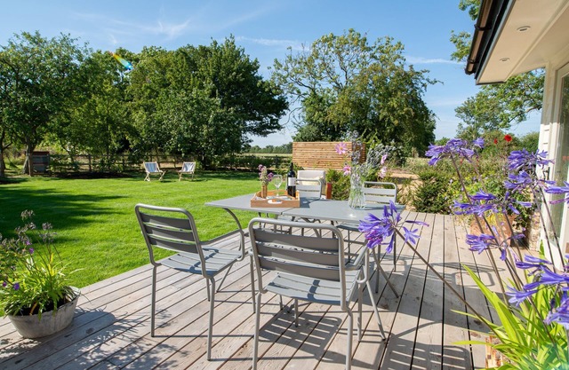 Skylarks, enjoy the decking overlooking your garden and wildflower meadow
