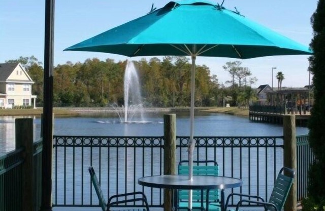 Stylish 2-Story Townhome: 4BR, 4 Pools, 2 Playgrounds, and Resort Perks Galore!