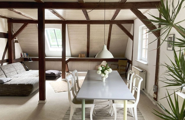 Stylish and bright apartment in a listed half-timbered house with a large garden