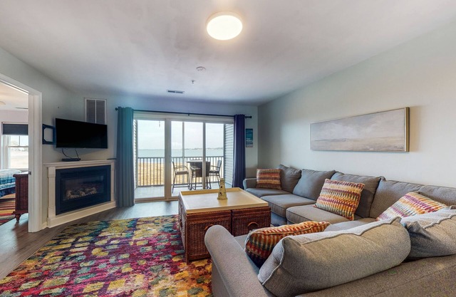 Stylish coastal gem with amazing river & bay views - steps to sandy beach