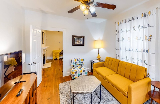 Stylish cottage in the heart of town w/ yard, full kitchen, central AC, & more!