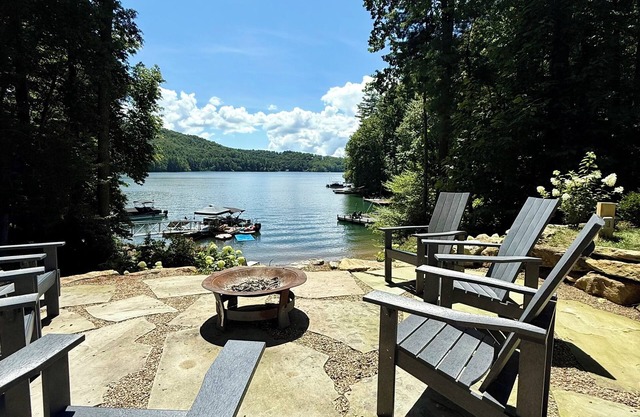 Renovated lake front mountain home with large yard, patio, hot tub & open view!