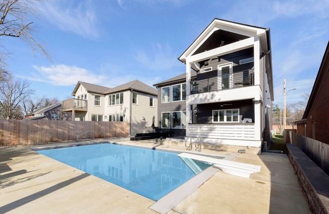 Luxury Modern Retreat: Heated Pool, Gym, Theater, Outdoor Kitchen, Wet Bar