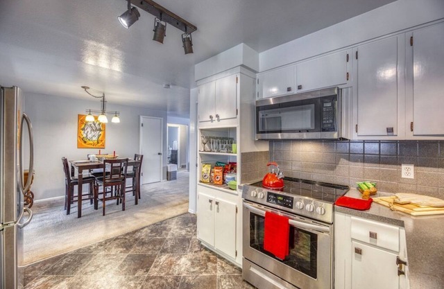 Transitional Housing with Panoramic Sunroom