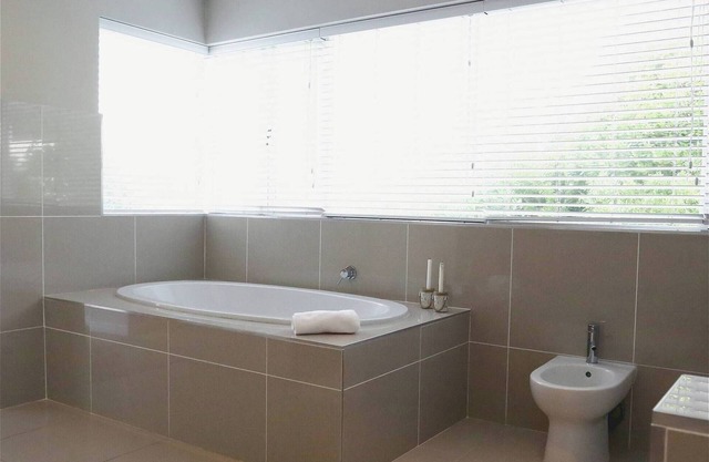 Summerlane BnB - Chambre Pegasus avec terrasse et vue sur le jardin
