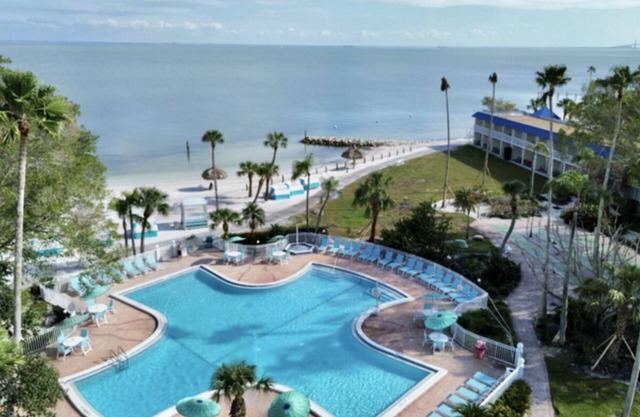 Sun-Kissed Serenity: Private Beach and Onsite Pool, Balcony, Pets Allowed