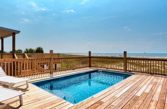 Sunny and 75- June 14th opening. Pool, on the beach