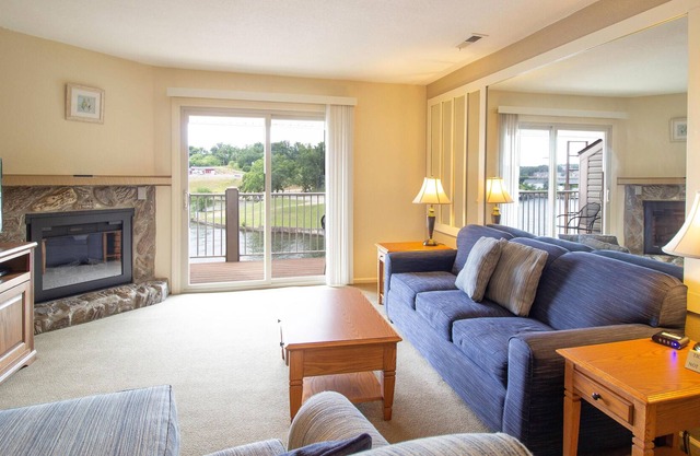 Sunny Condo 204 w/ Full-Sized Kitchen, Grill, & Deck Overlooking the Lake