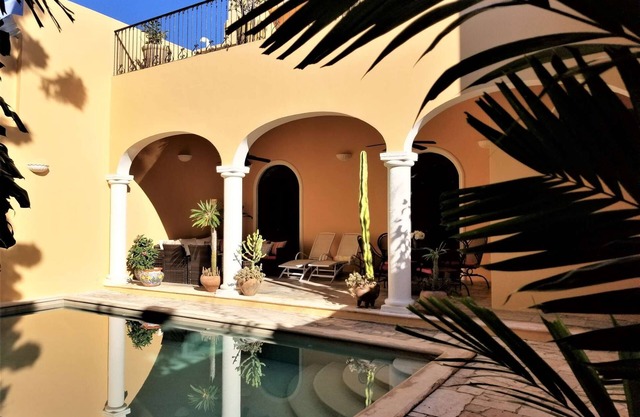 Sunny, warm two-story colonial home located just one block from parque Santa Lucia,