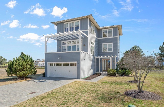 SUNRISE 2 SUNSET VIEWS! Enjoy our beautiful, spacious home steps from the beach!