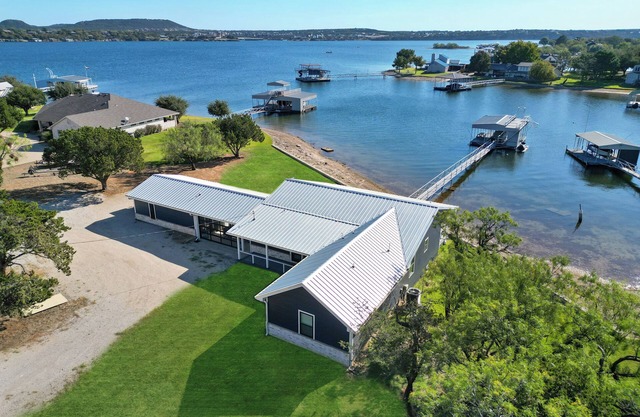 Sunrise Shore: Lakefront property with a private dock and slide. Sleeps 14