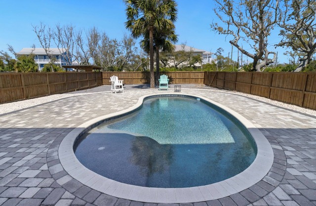 NEW LISTING! Sunset Beach House sleeps 6, steps from beach! Private pool!