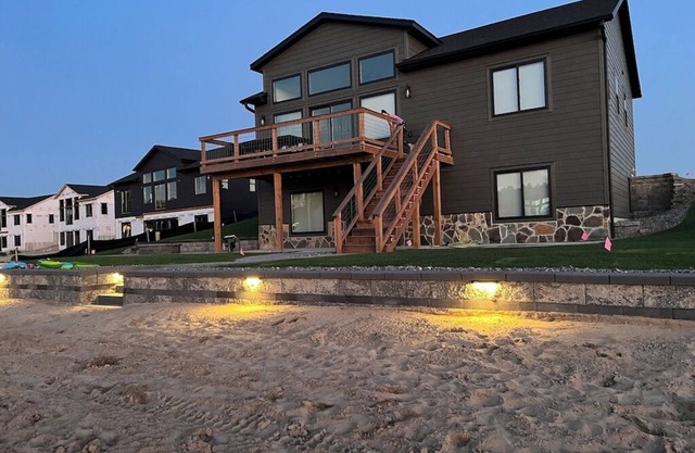 Sunset Lake Paradise new 4-bedroom lake house with private beach, WiFi, and AC