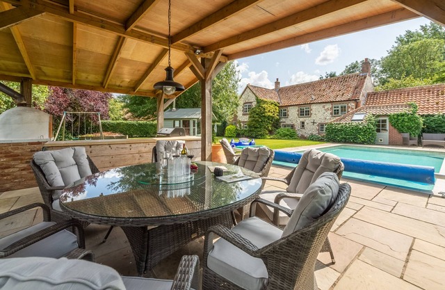 Swan Cottage est un grand cottage traditionnel de Norfolk en craie et brique