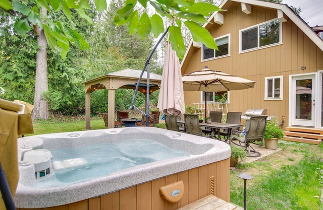 La maison du nid du hibou avec bain à remous et fauteuil de massage!
