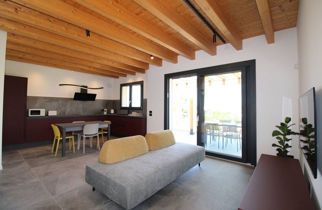 Terrace 4. Two-bedroom cottage with lake view