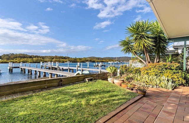 THE BOATHOUSE @ EMPIRE BAY | Private jetty, pool, waterfront | Accom Holidays
