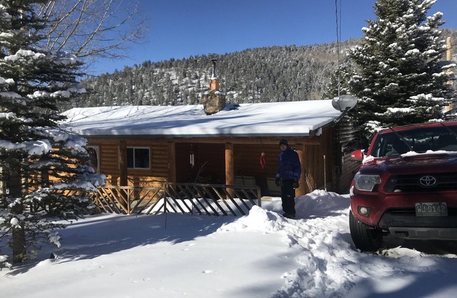 The Cabin back deck offers stunning views and only 15 minutes from Sipapu Skiing