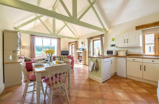 Cette conversion de grange magnifique est dans le plus délicieux des paramètres