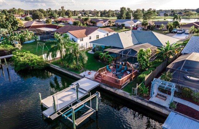 The Flamingo- Waterfront Home with heated pool, hot tub and kayaks!