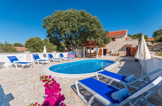The Grandfathers courtyard villa with heated pool