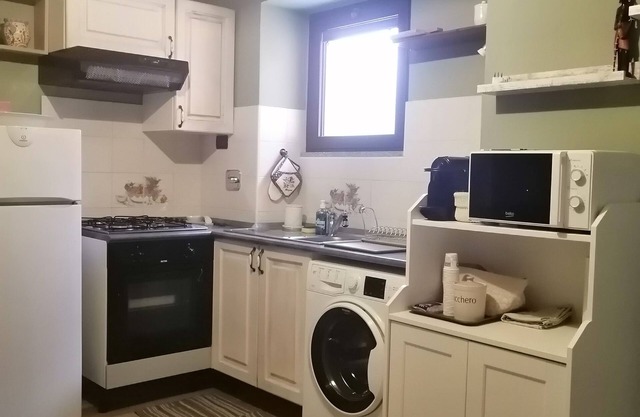 The Little House, detached 50 sq m with private, enclosed parking.