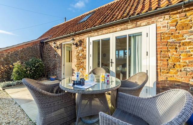 Une fabuleuse conversion d'une grange bijou primée dans le paisible village de Ringstead