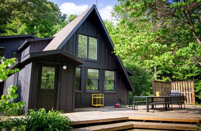 A-Frame Cabin in the woods, pool & firepit, sleeps 19 in Ada, MI (Pet Friendly!)