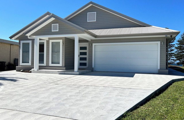 The Ocean’s Edge is a contemporary coastal home with stunning beach views.