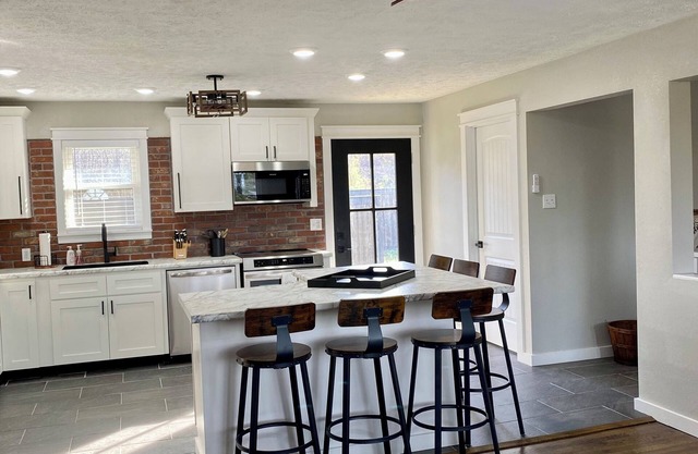 Charming 3-bedroom home in Marshall with private backyard inground swimming pool