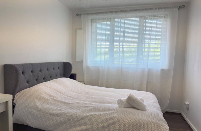 The room is furnished with a comfortable bed, desk, and high-speed Wi-Fi