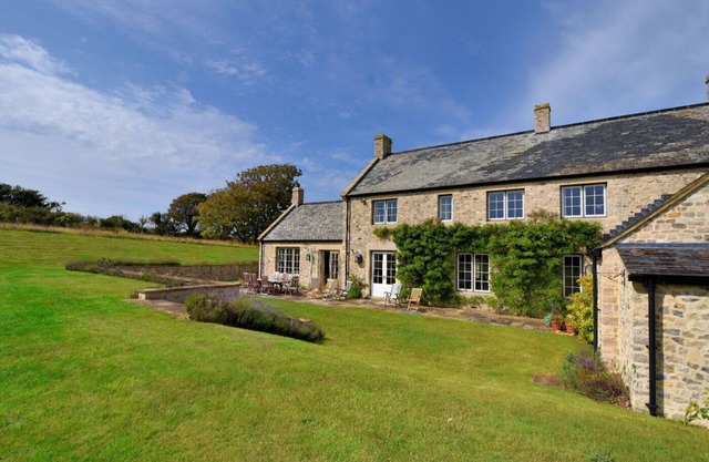 THE STONE HOUSE, pet friendly, with open fire in Seaton, Devon