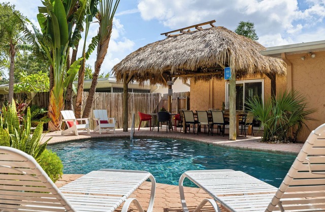 Tropical Oasis Home with Pool and Tiki Hut, Close to the Beach!