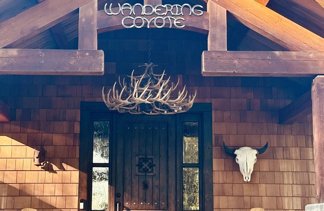 The "Wandering Coyote" riverfront home located on the Swan River in Bigfork, MT.