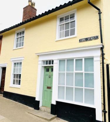 The Yellow cottage on the hill.
