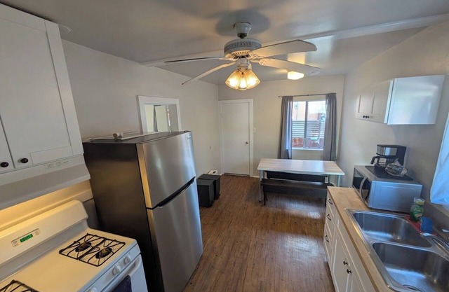This charming two-bedroom, one-bath duplex is your ideal coastal retreat, offering an authentic beach town experience just a short distance from the water.
