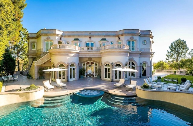 This house is a 8 bedroom(s), 9 bathrooms, located in Beverly Hills, CA.