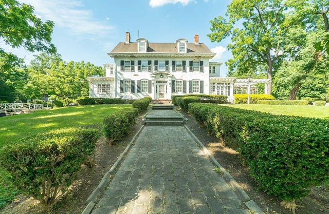 This is a beautiful family-friendly historic mansion on a private lake.