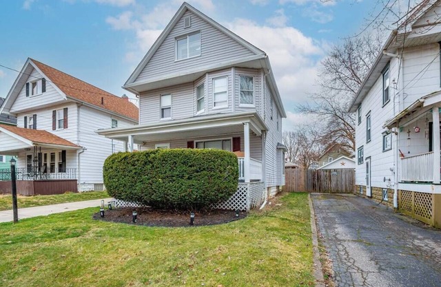 This vintage home in Akron provides easy access to nearby cities & attractions.
