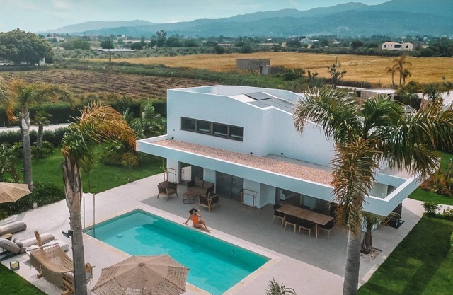 Thrilling Kos Villa | Villa James-Sirius | 3 Bedrooms | Spacious Furnished Sun Terrace | Private Outdoor Pool | BBQ Facilities | Shaded Outdoor Dining Area | Tesla Car Included | Shared Outdoor Gym, Playground, Cinema and Bar | Tigaki
