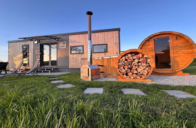 Tinyhouse premium Seeblick avec sauna et bain א remous