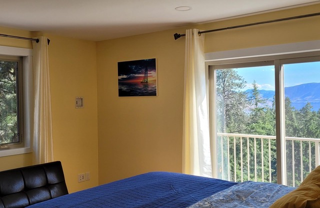 New construction Coach house with breathtaking views of the Okanagan Lake