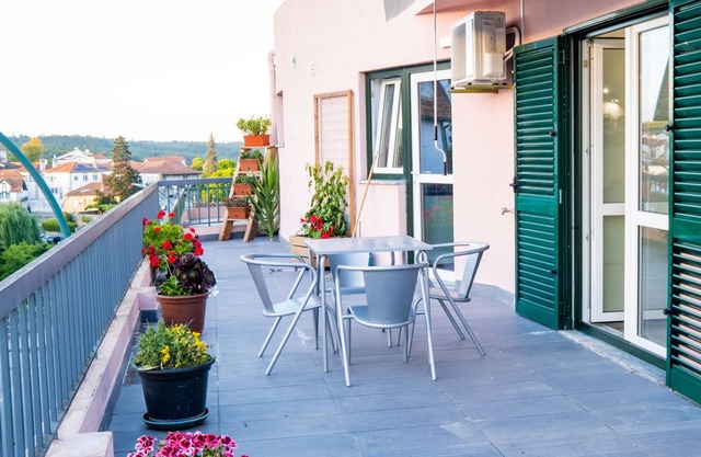 Top floor apartment with incredible outdoor space