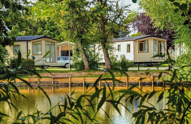 Top of the range 12ft-wide caravan with one double and two twin.