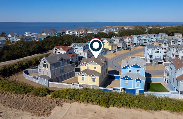 Towering beach house with a private hot tub, pool, WiFi, & washer/dryer