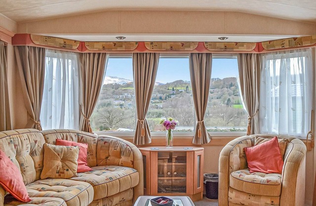 Traditional yet comfortable caravan with one double and two twins.