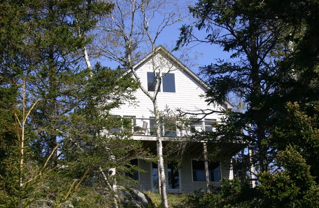 Tranquille chalet en bord de mer sur la baie de Wohoa